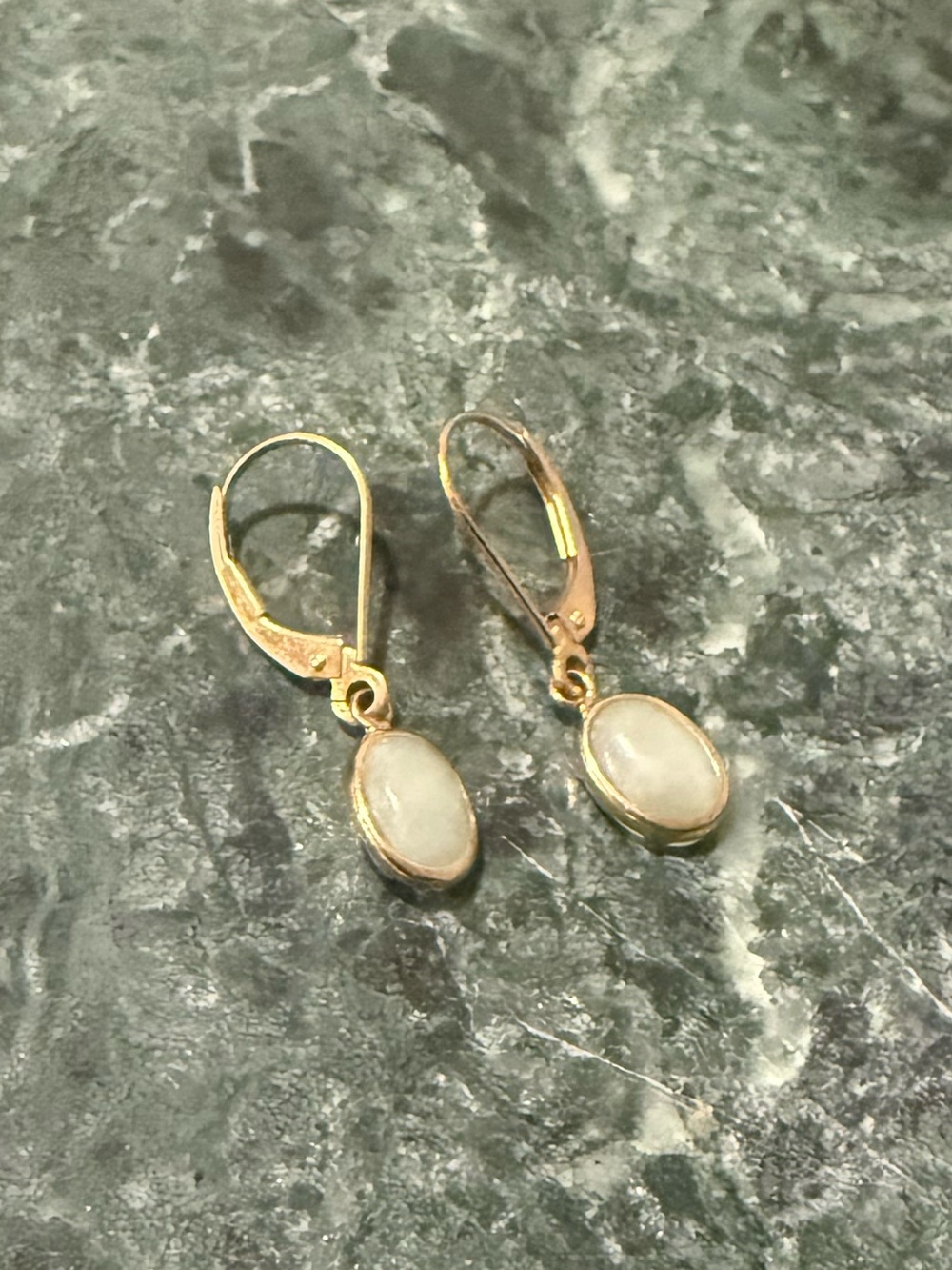 Gold Leverback Earrings with White Oval Stones